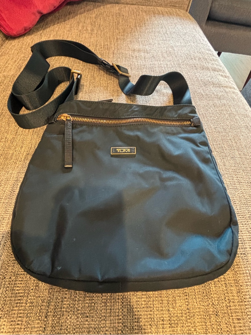 Tumi Navy Nylon Crossbody with Gold Hardware